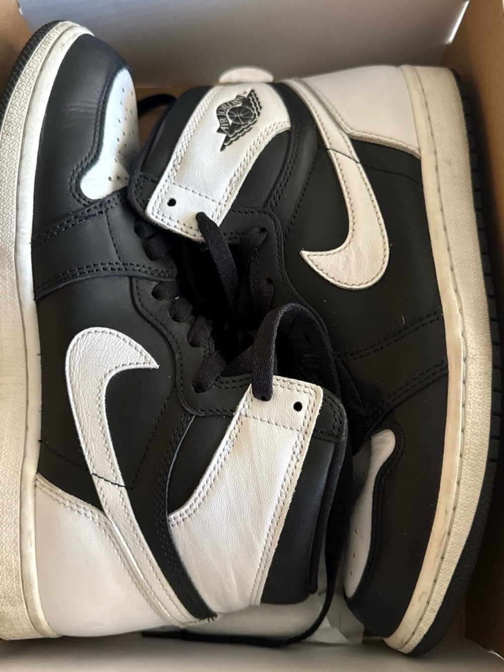 Jordan Black and White High-Top Sneakers